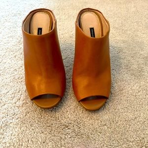 Beautiful French Connection peep toe tan heels. Size 7.5